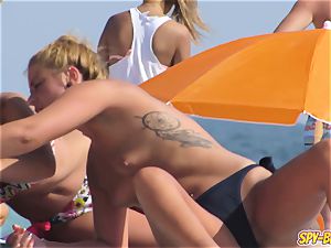 hot bikini teens g-string stripped to the waist voyeur Spy Beach
